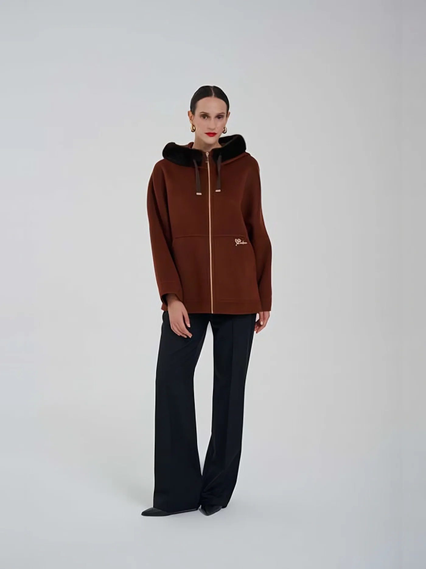 Fur-Hooded Zip Jacket — عارضة ترتدي · 1/1