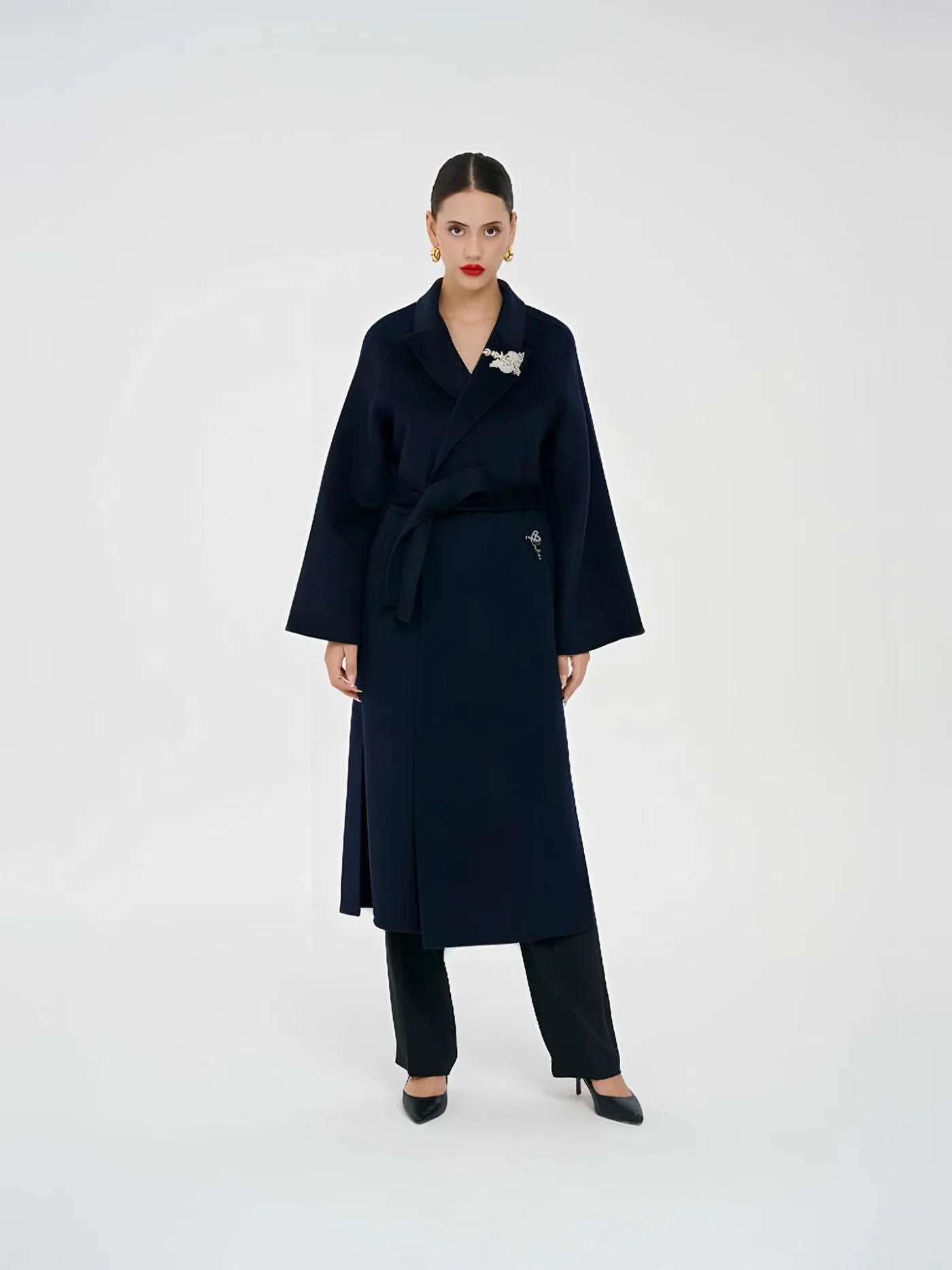 Belted Coat with Brooch — عارضة ترتدي · 1/1
